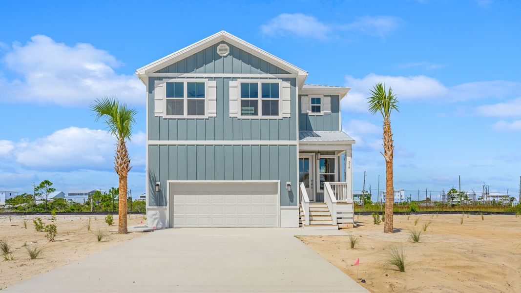 Front exterior of a new home in Redfish Cove at Cape San Blas, Port Saint Joe, FL, highlighting curb appeal (Image 2).