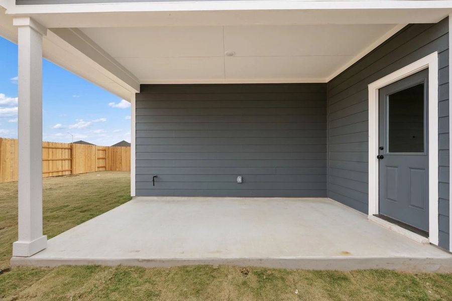 Exterior details and patio area of a home in Lariat, Liberty Hill (Image 4).