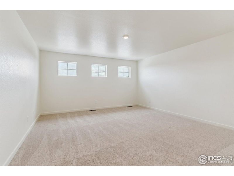 Spacious, unfurnished interior of a new home in Ridge at Johnstown, Johnstown (Image 13).