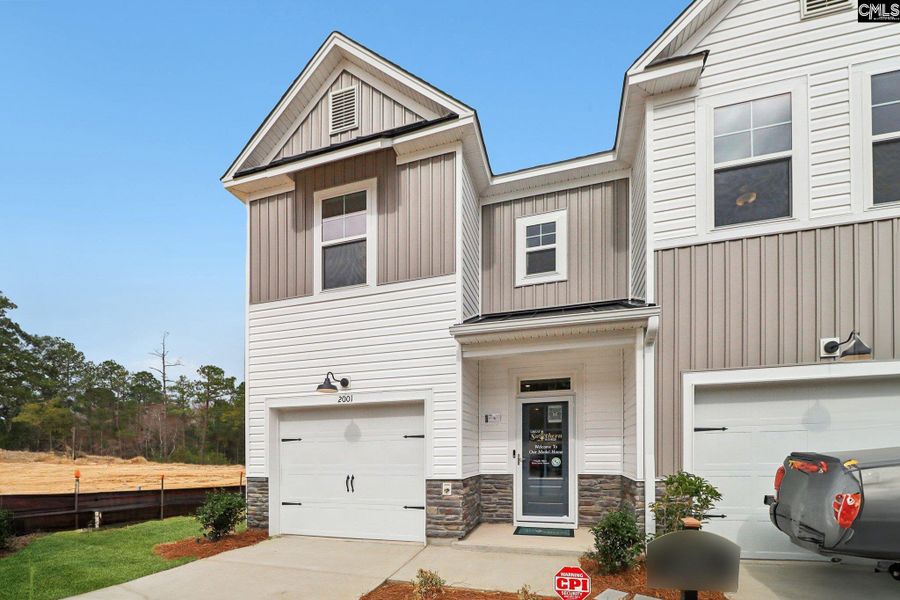 Front exterior of a new home in Victory Woods, Columbia, SC, highlighting curb appeal (Image 27). Front exterior of a new home in Victory Woods, Columbia, SC, highlighting curb appeal (Image 27).