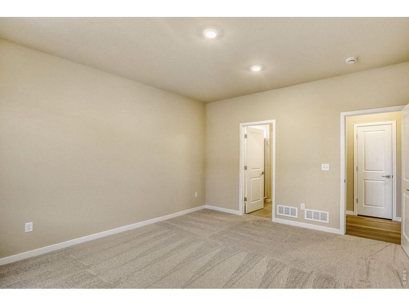 Spacious, unfurnished interior of a new home in Farmstead, Berthoud (Image 22).