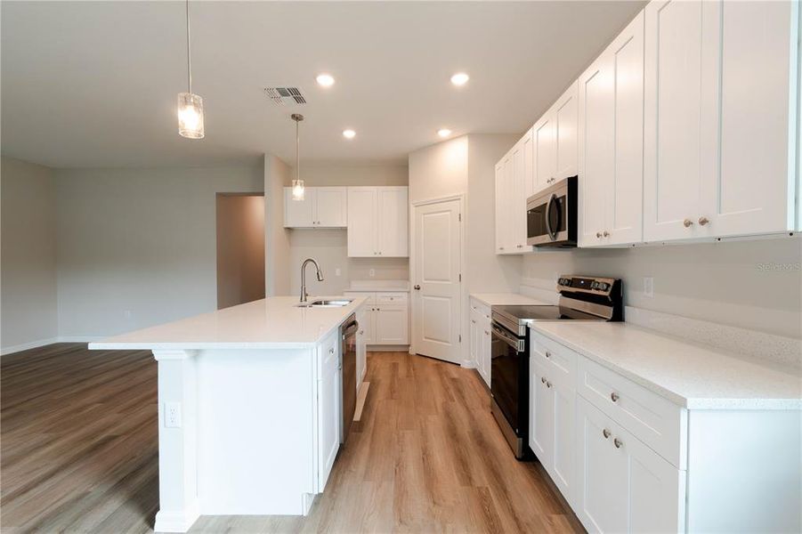 Furnished interior view inside a new home in , Leesburg (Image 5). Furnished interior view inside a new home in , Leesburg (Image 5).