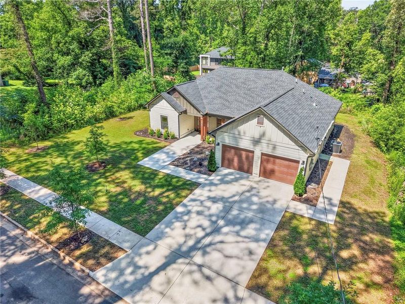 Front exterior of a new home in , Tucker, GA, highlighting curb appeal (Image 27).