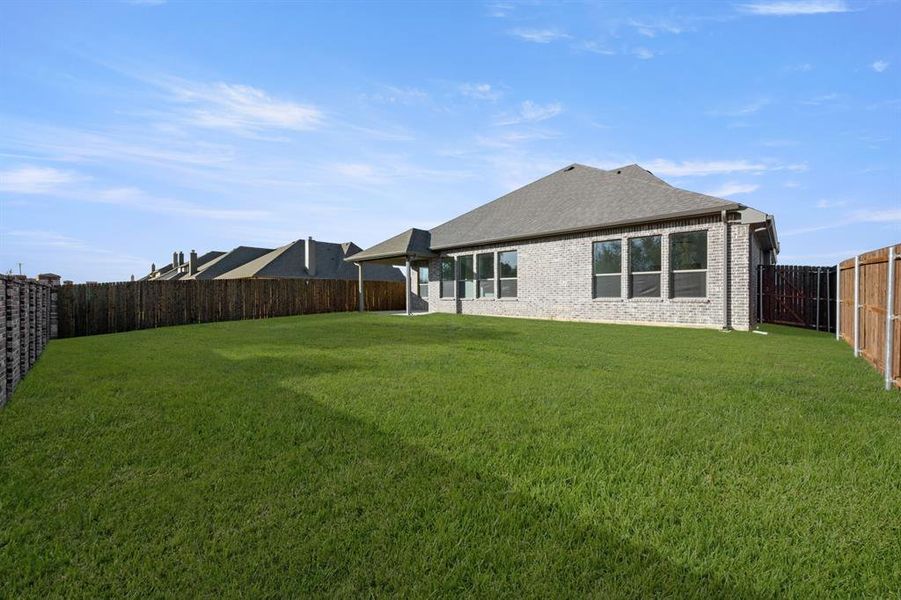 Exterior details and patio area of a home in Mockingbird Hills, Joshua (Image 23). Exterior details and patio area of a home in Mockingbird Hills, Joshua (Image 23).