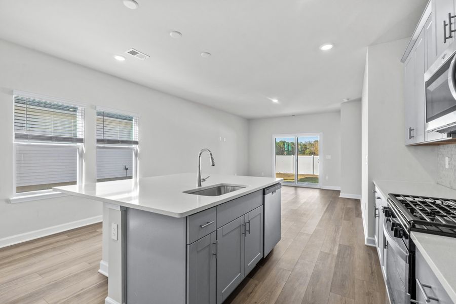 Furnished interior view inside a new home in Cypress Ridge - The Boardwalk Series, Longs (Image 8).