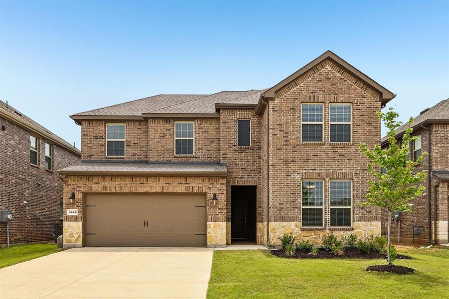 Front exterior of a new home in Silverado, Aubrey, TX, highlighting curb appeal (Image 25).