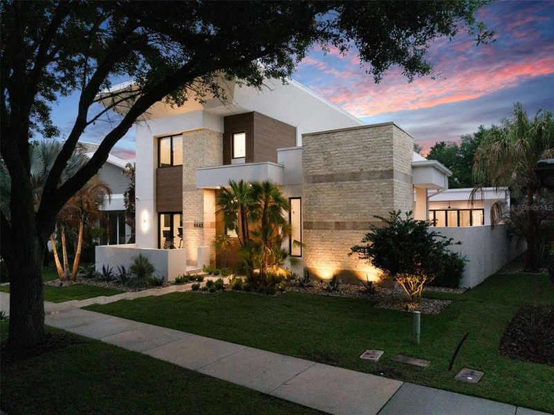 Front exterior of a new home in , Orlando, FL, highlighting curb appeal (Image 27).