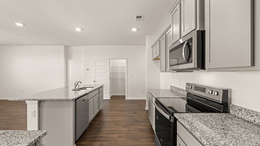 Representative furnished interior of a home built from the Belfort by D.R. Horton in Locust Grove Station - Cedar Ridge, Locust Grove (Image 7).