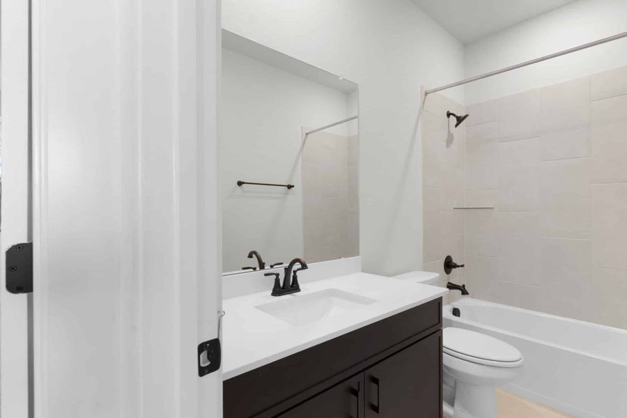 Representative furnished interior of a home built from the Julia by Chesmar Homes in Nolina, Georgetown (Image 5).