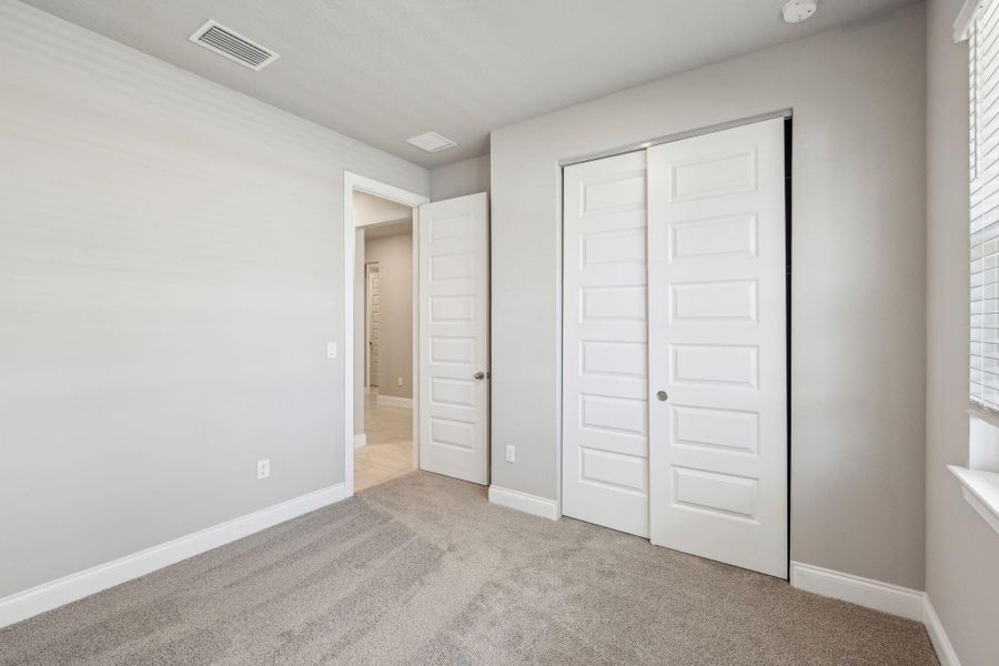 Spacious, unfurnished interior of a new home in Brystol at Wylder - Reserve Series, Port St. Lucie (Image 22).
