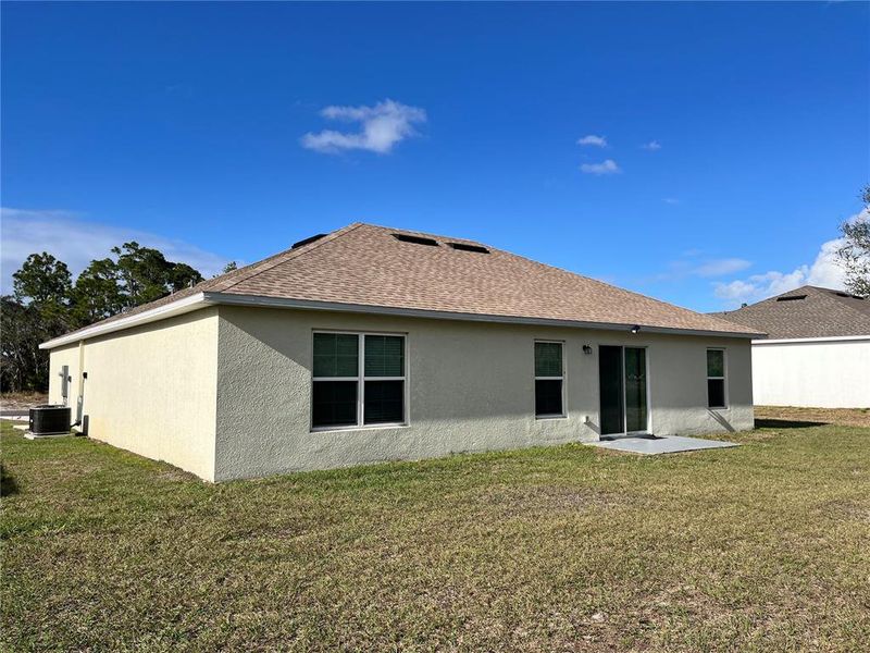 Exterior details and patio area of a home in , Sebring (Image 3).