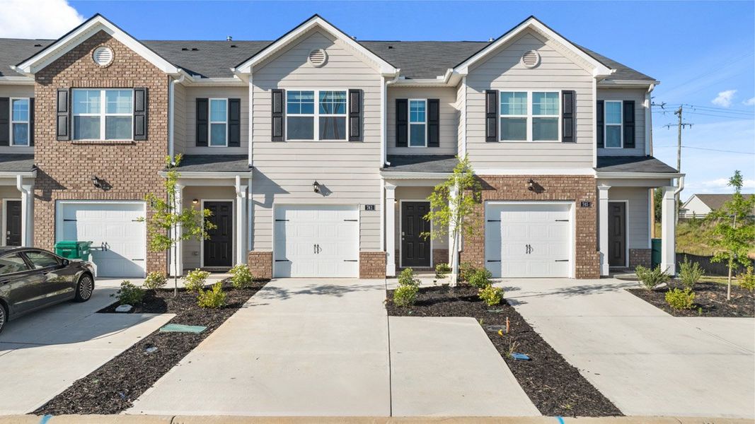 Front exterior of a new home in Laurel Park Townhomes, Hephzibah, GA, highlighting curb appeal (Image 18).