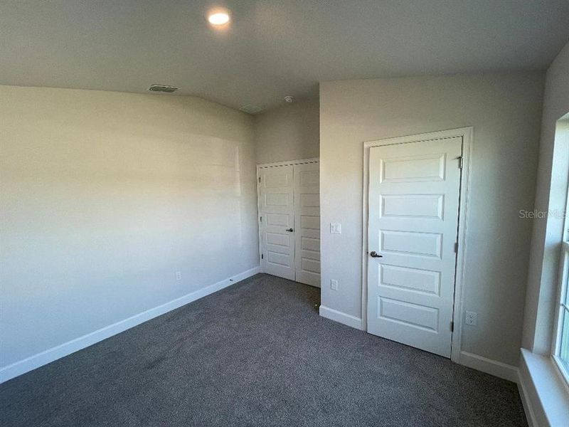 Spacious, unfurnished interior of a new home in Abbey Glen, Dade City (Image 17).