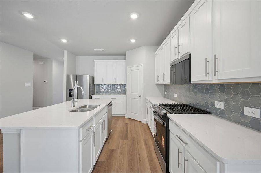 Photo is not of the actual home, but is an inspirational photo of builder’s model home and may depict options, furnishings, and/or decorator features that are not included.