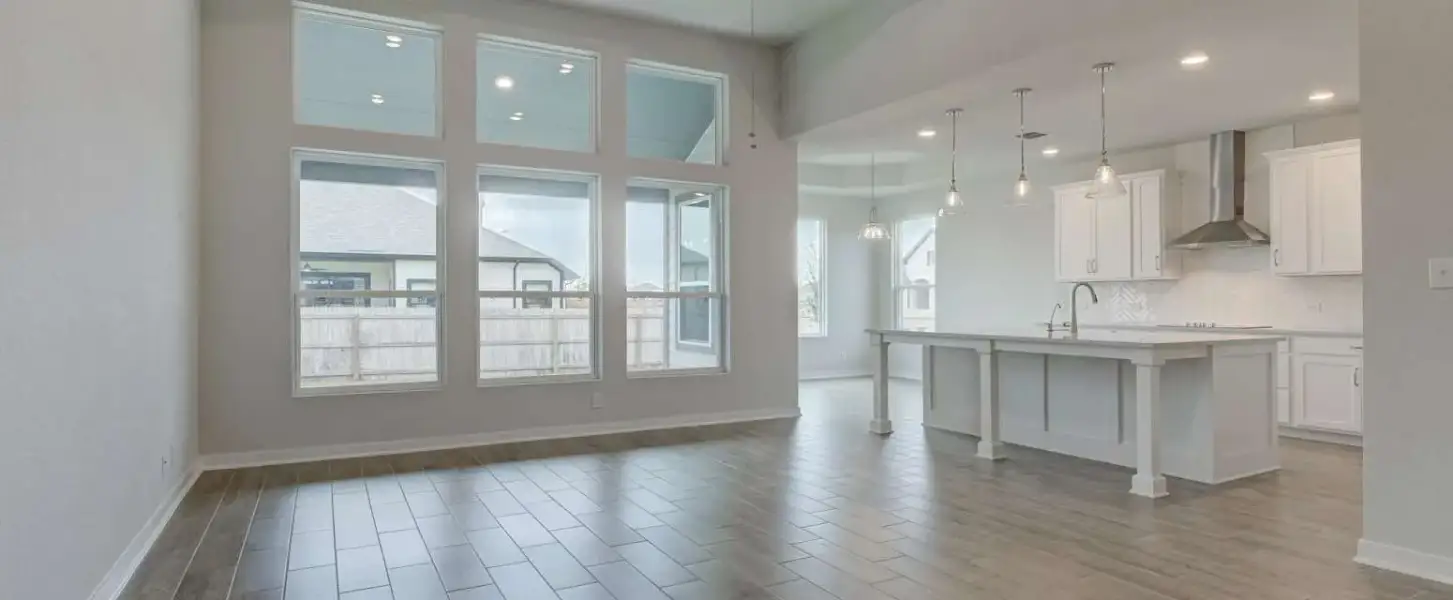Representative unfurnished interior of a home built from the Guadalupe by Ashton Woods in Saddlebrook Ranch, Schertz (Image 12).