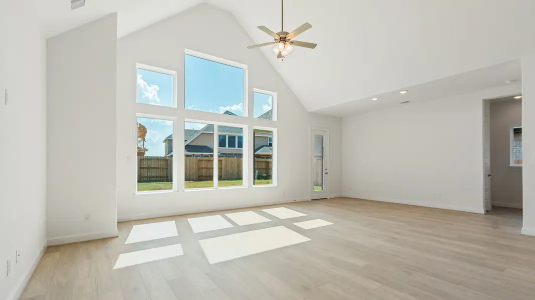 Representative furnished interior of a home built from the Vanderbilt by DRB Homes in Creekhaven, Iowa Colony (Image 7).