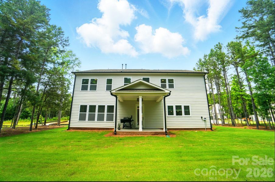 Exterior details and patio area of a home in Fairview Forest, Indian Trail (Image 29).