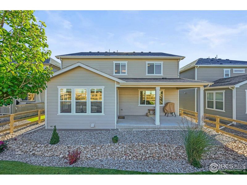 Exterior details and patio area of a home in Prairie Song, Windsor (Image 4).