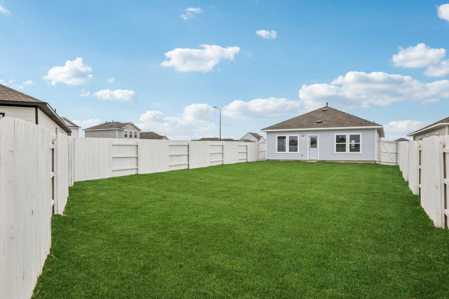 Exterior details and patio area of a home in Harvest Ridge, Elgin (Image 20).