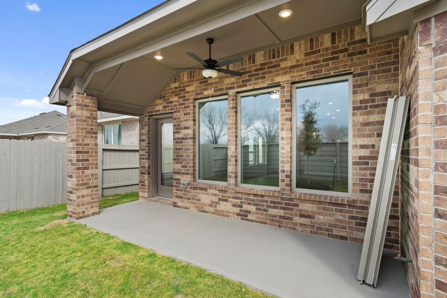 Exterior details and patio area of a home in Pomona, Manvel (Image 21).