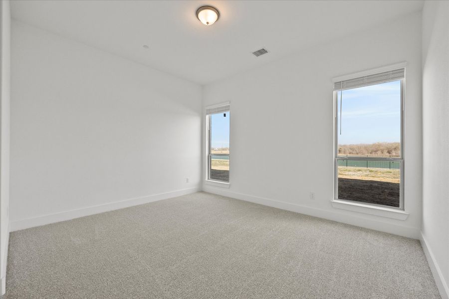 Representative unfurnished interior of a home built from the Davenport by Windsor Homes in Winding Creek, Rockwall (Image 30).