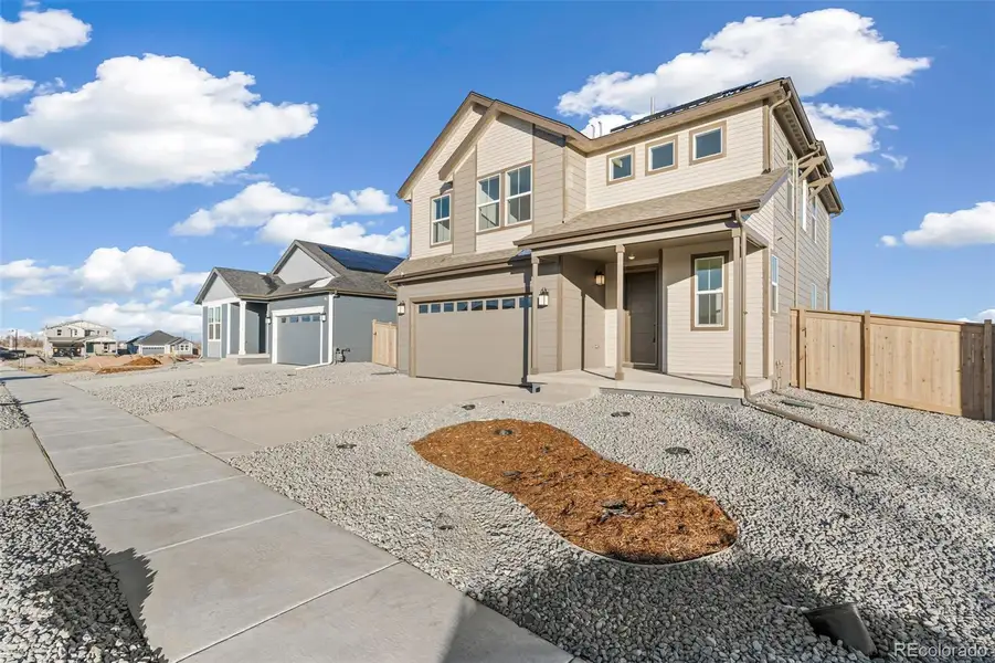 Exterior details and patio area of a home in The Nest Classic at Canyon Creek, Erie (Image 4).