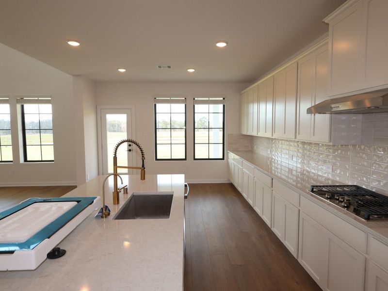 Furnished interior view inside a new home in Lone Star Landing, Montgomery (Image 12).