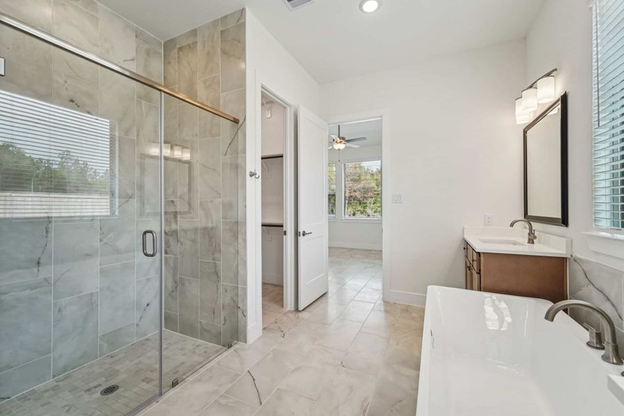 Representative furnished interior of a home built from the Lauren by Chesmar Homes in University Heights, Round Rock (Image 9).