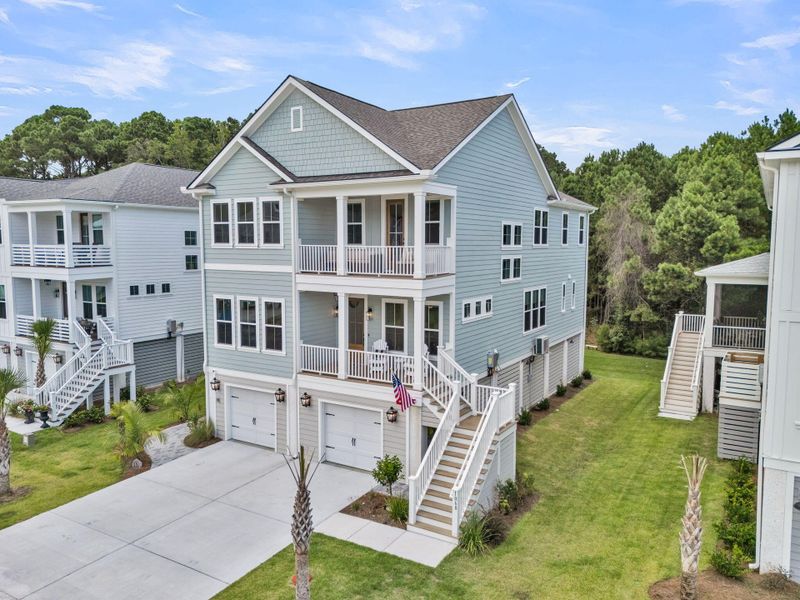 Front exterior of a new home in Overlook at Copahee Sound, Awendaw, SC, highlighting curb appeal (Image 25).