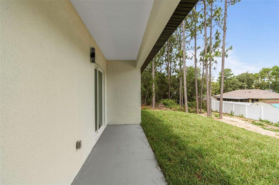 Exterior details and patio area of a home in , Citrus Springs (Image 19).