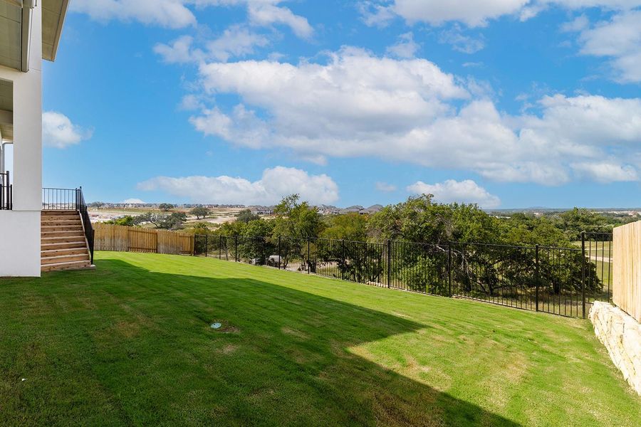 Exterior details and patio area of a home in Lariat - 80', Liberty Hill (Image 4). Exterior details and patio area of a home in Lariat - 80', Liberty Hill (Image 4).