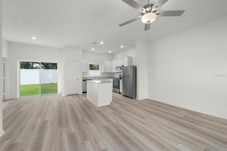 Furnished interior view inside a new home in Tula Parc, Astatula (Image 8).