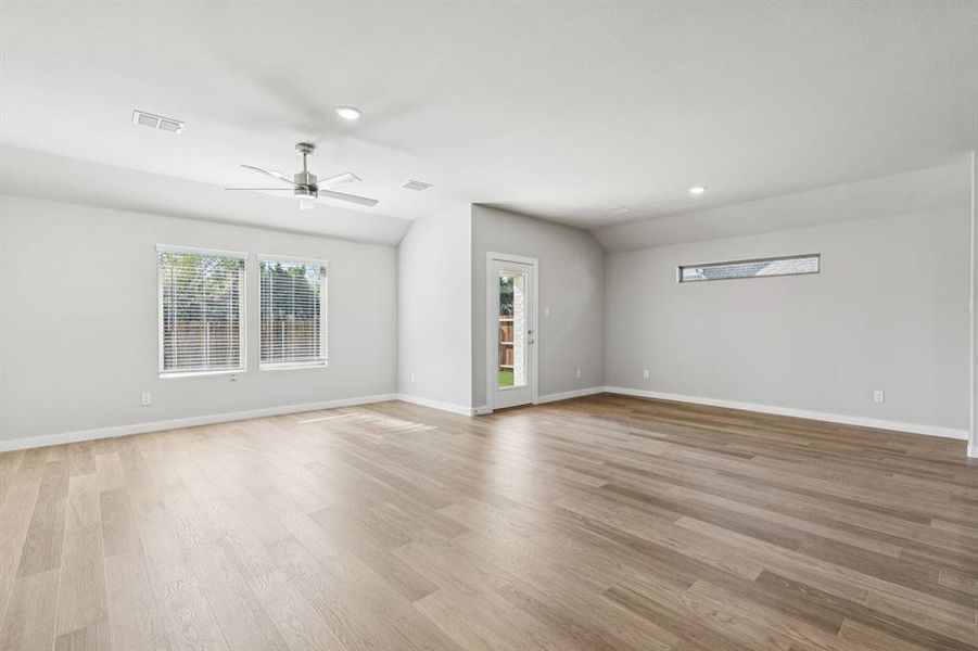 Living and Dining Room in the Heisman home plan by Trophy Signature Homes – REPRESENTATIVE PHOTO Living and Dining Room in the Heisman home plan by Trophy Signature Homes – REPRESENTATIVE PHOTO