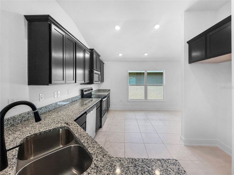 Furnished interior view inside a new home in Harmony Central, St. Cloud (Image 5).