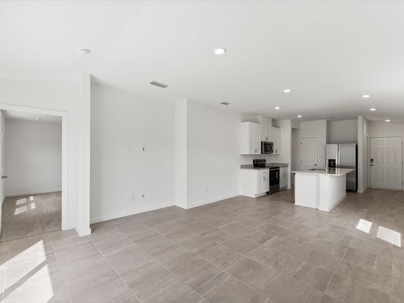 Spacious, unfurnished interior of a new home in Flagler Village - Classic Series, Palm Coast (Image 10). Spacious, unfurnished interior of a new home in Flagler Village - Classic Series, Palm Coast (Image 10).