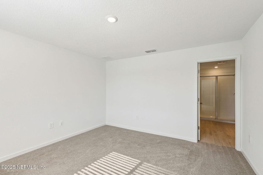 Spacious, unfurnished interior of a new home in Cypress Meadows - Signature Series, Jacksonville (Image 17).
