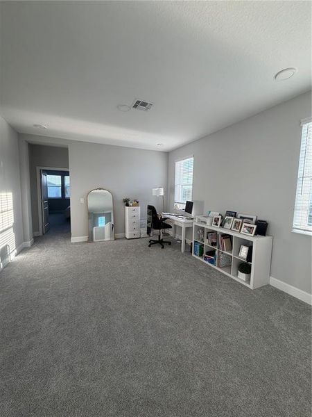 Furnished interior view inside a new home in Center Lake on the Park, St. Cloud (Image 14).