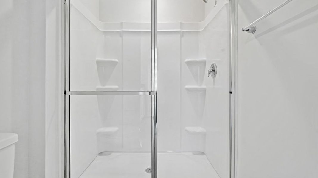 Representative unfurnished interior of a home built from the BAYSHORE by D.R. Horton in Indigo Preserve Townhomes, Leland (Image 25).