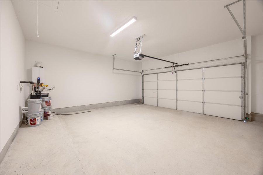 Garage with a garage door opener Garage with a garage door opener