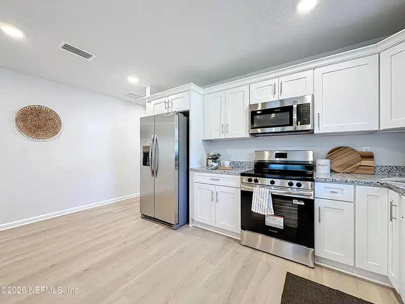 Furnished interior view inside a new home in , Jacksonville (Image 11).