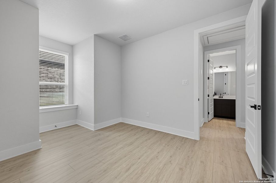 Spacious, unfurnished interior of a new home in The Reserve at Potranco Oaks, Castroville (Image 25).