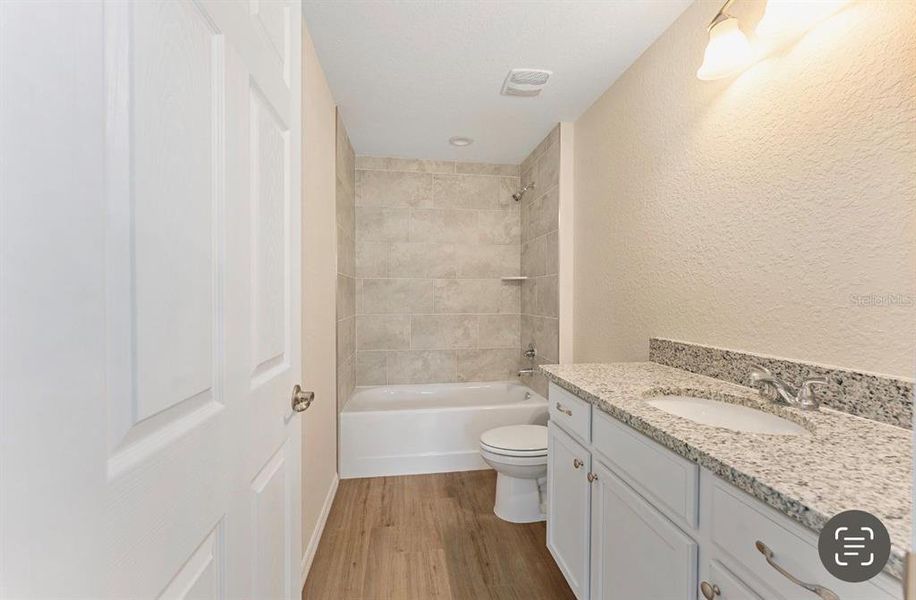 Furnished interior view inside a new home in , Dunnellon (Image 7).