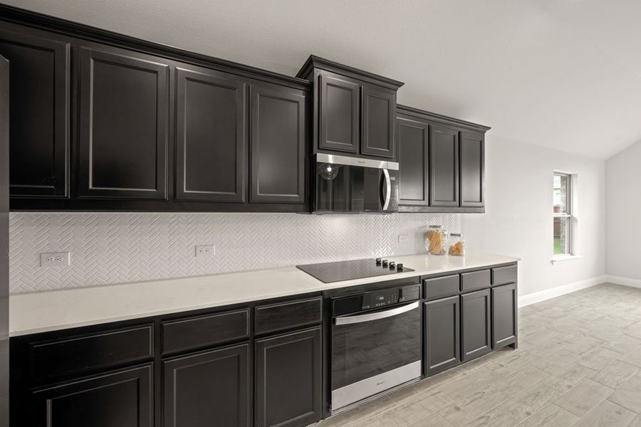 Representative exterior photo of a completed home built from the Balmoral by Impression Homes in Timberbrook, Justin, TX (Image 6).