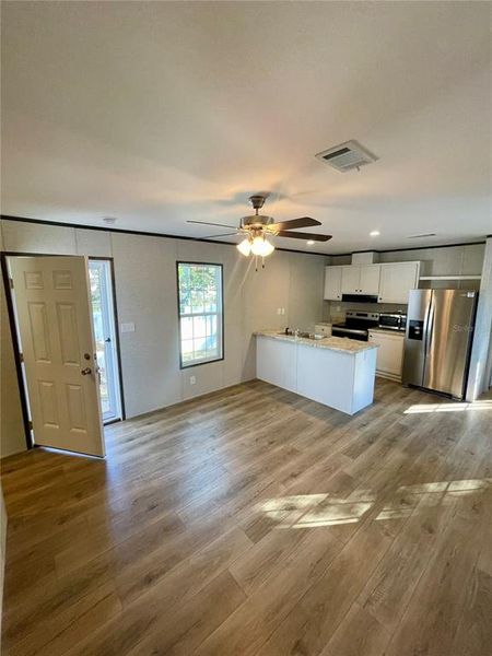 Spacious, unfurnished interior of a new home in , New Port Richey (Image 24).