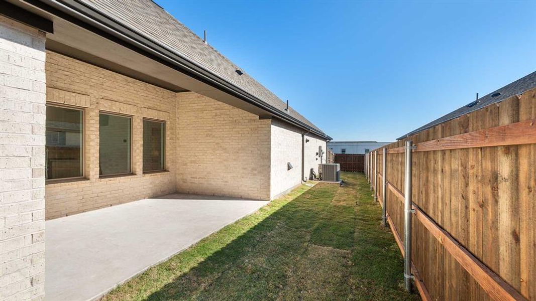Exterior details and patio area of a home in Avondale 40', Fate (Image 4). Exterior details and patio area of a home in Avondale 40', Fate (Image 4).