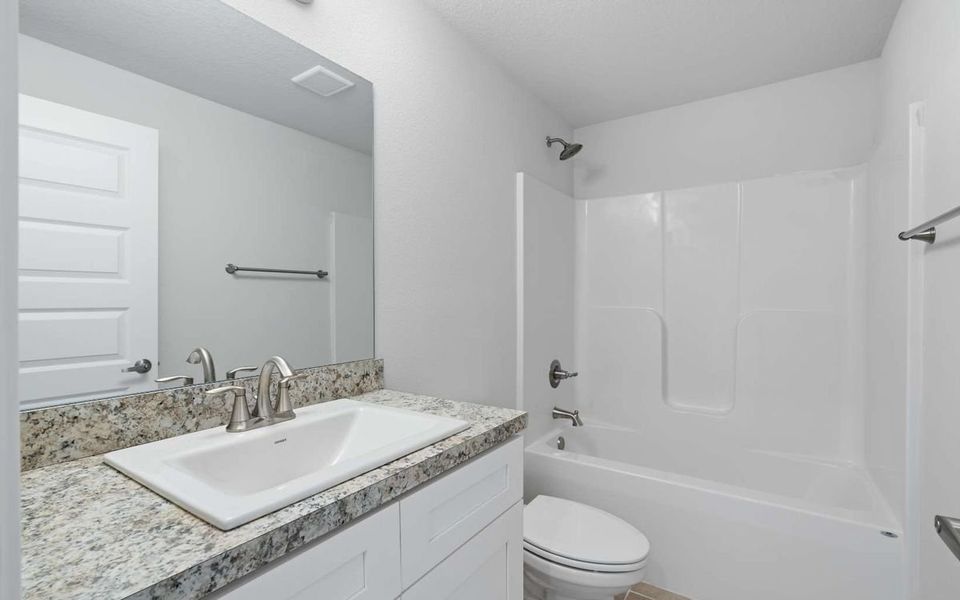 Representative furnished interior of a home built from the Plan 1539 by Adams Homes in Rolling Hills, Bell (Image 4).