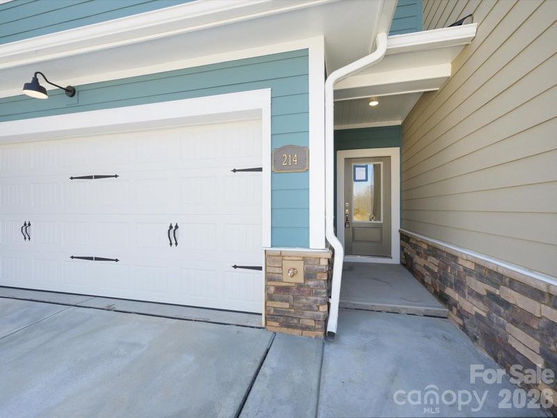 2 car side by side garage plus driveway with ample parking