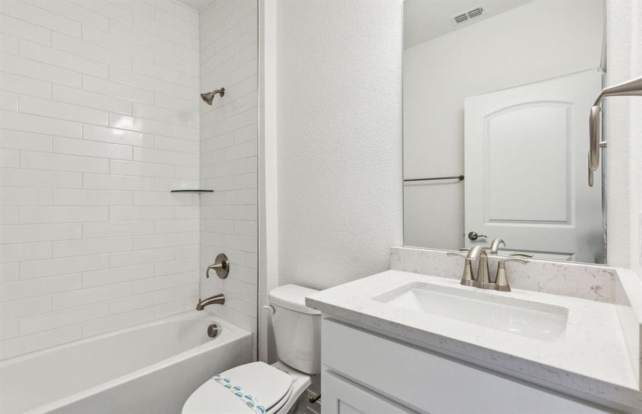 Spacious secondary bathroom *real home pictured