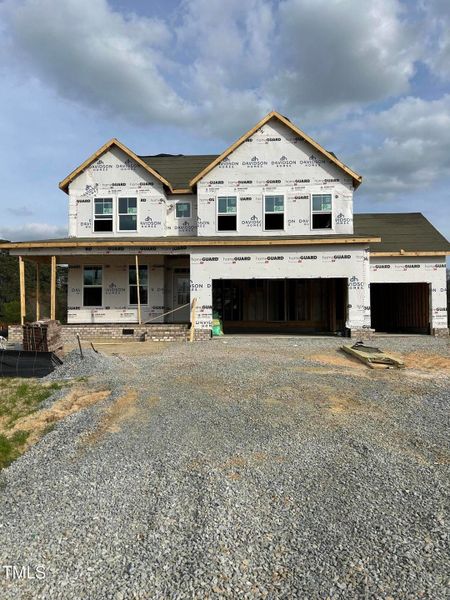 Front exterior of a new home in Tobacco Road, Angier, NC, highlighting curb appeal (Image 58). Front exterior of a new home in Tobacco Road, Angier, NC, highlighting curb appeal (Image 58).