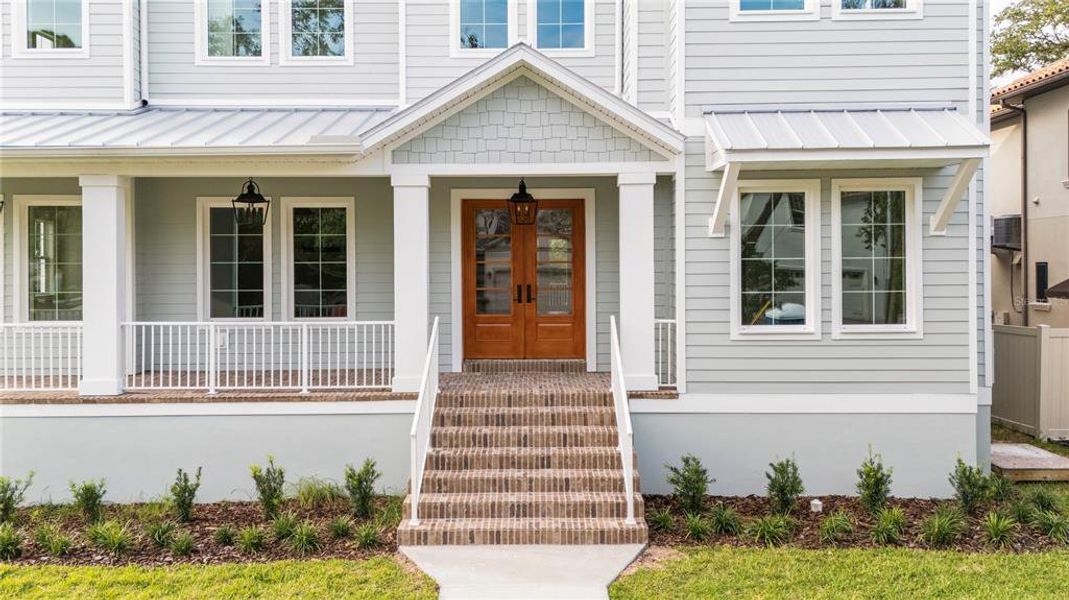 Front exterior of a new home in , Tampa, FL, highlighting curb appeal (Image 28). Front exterior of a new home in , Tampa, FL, highlighting curb appeal (Image 28).